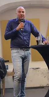 Het Leven en Werk van John van den Heuvel